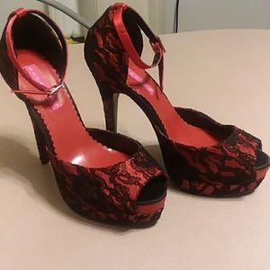 Red and black lace high heel shoes